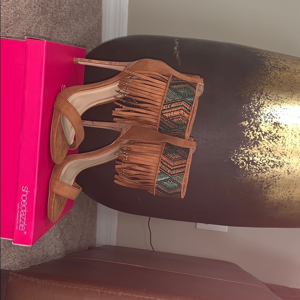 Tan fringed heels with Aztec detailing